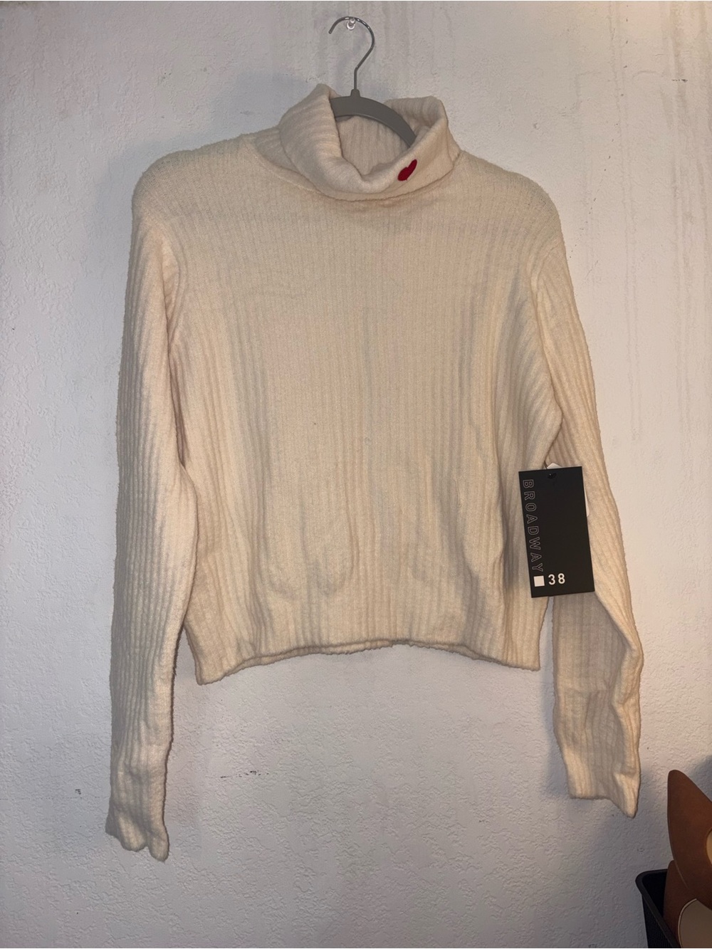 Cream Ribbed Turtleneck Sweater with Heart Accent